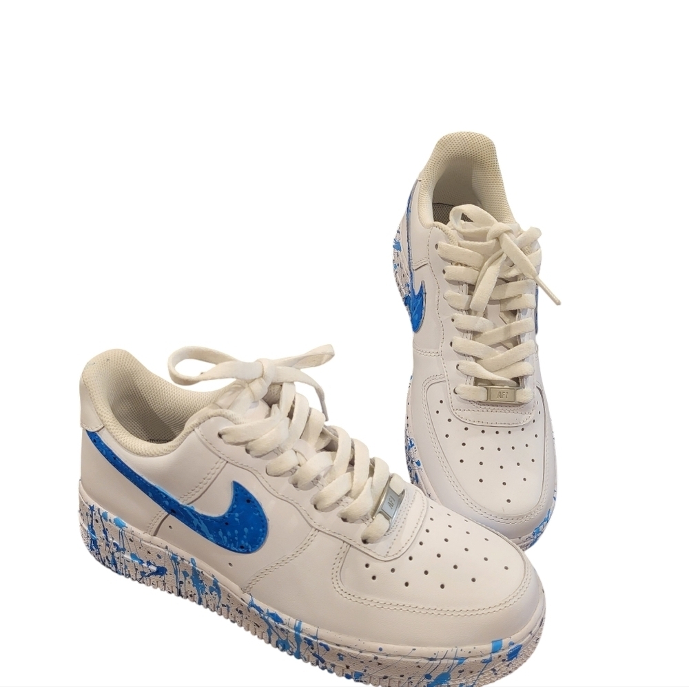 Nike White Sneakers with Blue Swoosh and Blue Splatter Sole